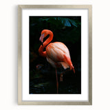 Stylish silver-framed wall art featuring a vibrant flamingo design, ideal for modern decor. The artwork is elegantly matted, enhancing its visual appeal.