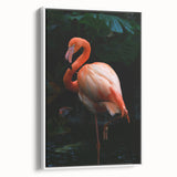 Framed canvas wall art featuring a vibrant flamingo design, showcasing pink and white hues against a clean white background, ideal for modern home decor.