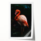 Vibrant flamingo wall art print featuring a tropical design with vivid pink and green colors, rolled for easy framing and display in any home decor.