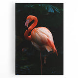 Flamingo-themed wall art on stretched canvas, showcasing vibrant pink and green colors against a serene blue background, perfect for modern home decor.