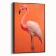 Framed canvas wall art featuring a vibrant flamingo design on a black background, showcasing tropical colors and modern decor style, ideal for enhancing living spaces.
