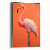 Framed wall art featuring a stylish flamingo design in vibrant colors, set against a gold background, showcasing a contemporary aesthetic for modern decor.