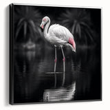 Framed canvas wall art showcasing a vibrant flamingo design in black and pink hues, perfect for adding a tropical touch to home decor. Ideal for bird lovers.