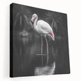 Vibrant flamingo-themed wall art stretched on canvas, showcasing pink flamingos amidst tropical foliage, perfect for enhancing modern home decor and adding a lively touch.