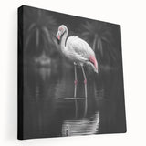 Vibrant flamingo-themed wall art stretched on canvas, showcasing pink flamingos amidst tropical foliage, perfect for enhancing modern home decor and adding a lively touch.