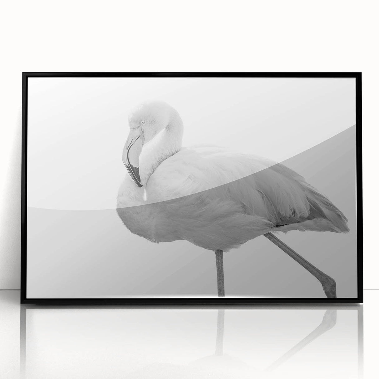 Framed acrylic wall art featuring a vibrant flamingo design on a sleek black background, perfect for adding a tropical touch to modern home decor.