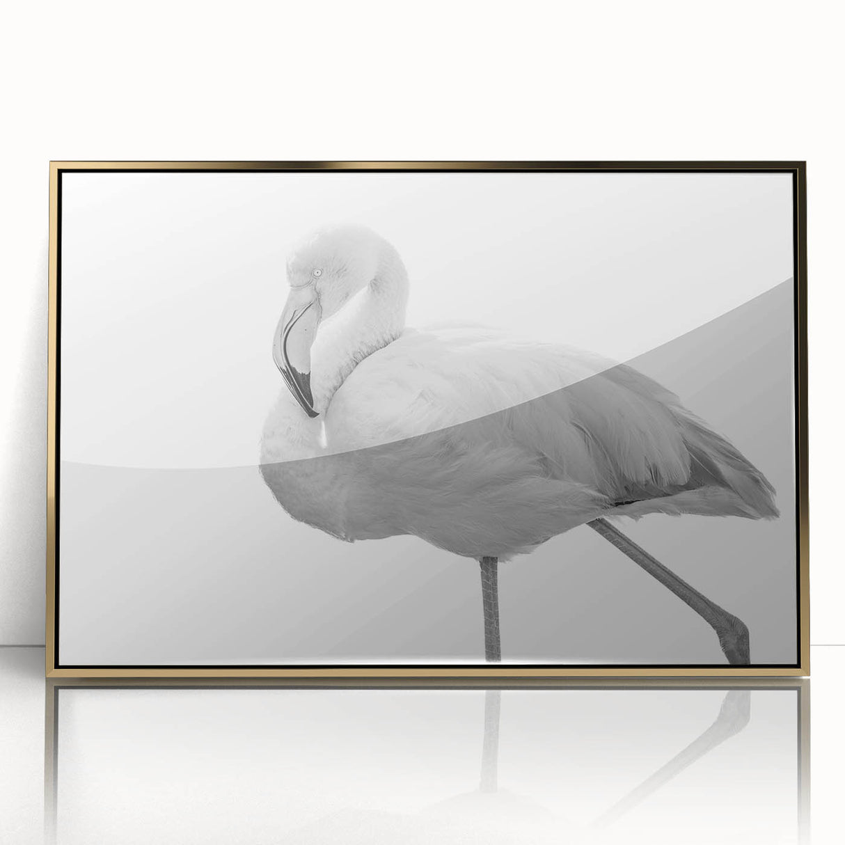 Framed wall art featuring a vibrant flamingo design with gold accents, perfect for adding a tropical touch to home decor. Ideal for nature enthusiasts and modern interiors.