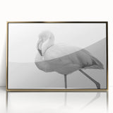 Framed wall art featuring a vibrant flamingo design with gold accents, perfect for adding a tropical touch to home decor. Ideal for nature enthusiasts and modern interiors.
