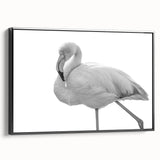 Framed wall art featuring a vibrant flamingo design, presented in a sleek black frame, showcasing a side view that highlights its modern aesthetic for home decor. This piece adds a colorful touch to any room, perfect for bird lovers and contemporary art enthusiasts.