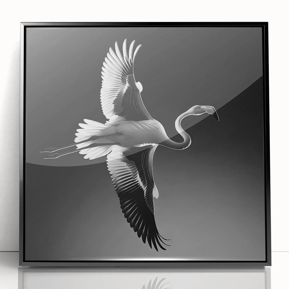 Framed acrylic wall art featuring a vibrant flamingo design on a black background, perfect for adding a tropical touch to home decor. Ideal for bird lovers.