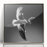 Framed wall art showcasing a vibrant flamingo design in a silver acrylic frame, perfect for modern home decor. Ideal for enhancing living spaces with tropical elegance.