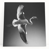 Vibrant flamingo wall art design printed on stretched canvas, showcased in a modern setting, perfect for tropical-themed home decor. Ideal for art enthusiasts.