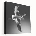 Stretched canvas wall art featuring a vibrant flamingo design in pink and green hues, showcasing tropical themes and perfect for enhancing home décor.