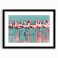 Framed wall art featuring a vibrant flamingo design in pink and black, complemented by a sleek black frame with a white mat, perfect for modern decor.