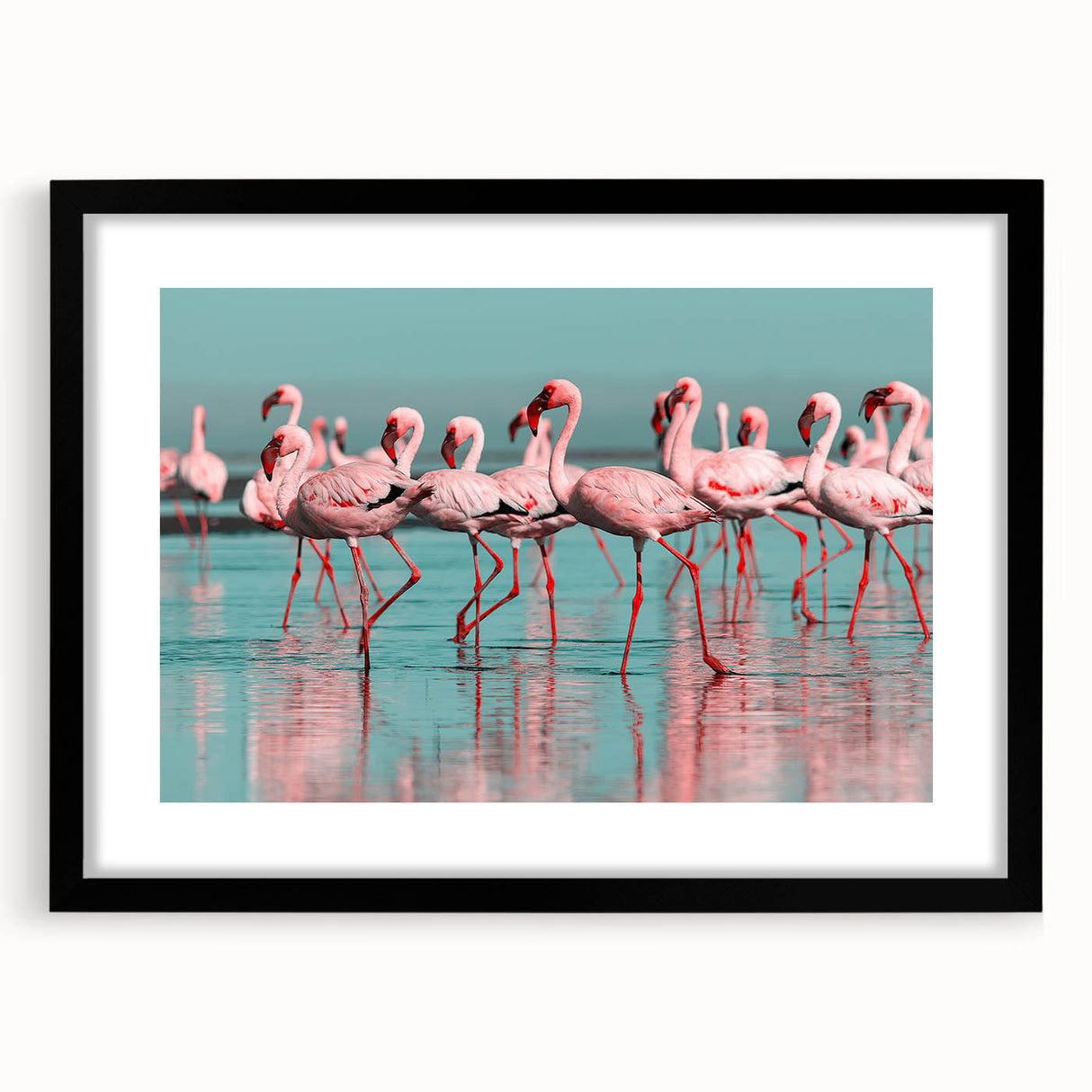 Framed wall art featuring a vibrant flamingo design in pink and black, complemented by a sleek black frame with a white mat, perfect for modern decor.
