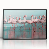 Framed wall art featuring a vibrant flamingo design on acrylic, set in a sleek black frame, ideal for modern home decor. Perfect for adding a colorful touch to any room.