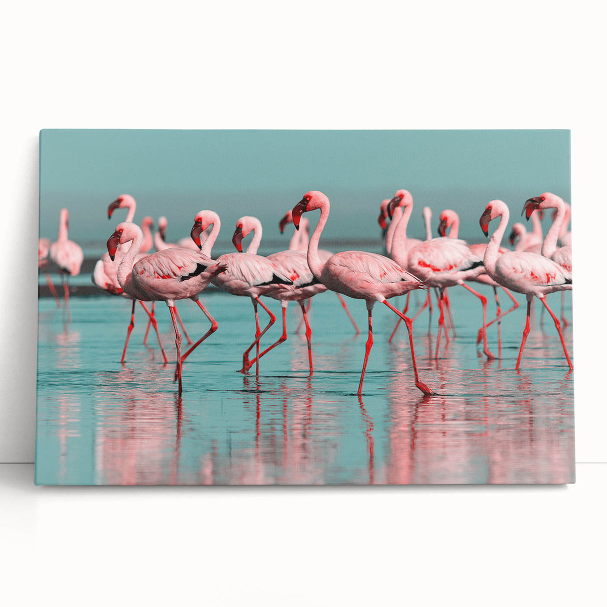 Flamingo-themed wall art on stretched canvas, showcasing vibrant pink and green colors, perfect for tropical decor. Ideal for enhancing living spaces.