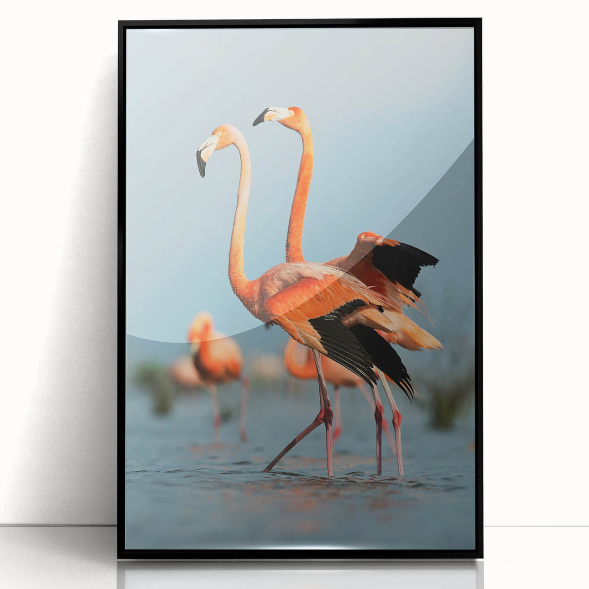 Framed wall art featuring a vibrant flamingo design in pink and black acrylic, showcasing a modern aesthetic suitable for contemporary decor.