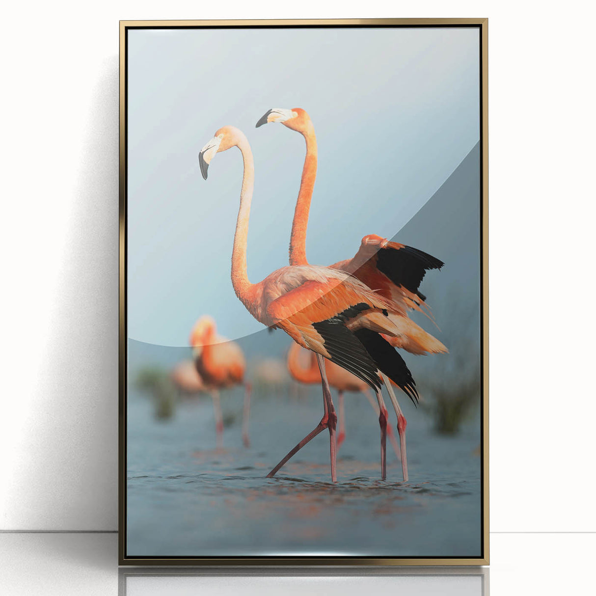 Framed wall art featuring a vibrant flamingo design with a gold acrylic front, ideal for adding a touch of elegance and color to modern interiors. Perfect for bird lovers and home decor enthusiasts, this artwork enhances any living space with its stylish and eye-catching aesthetic.