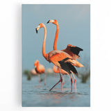Vibrant flamingo wall art design on stretched canvas featuring pink and green hues, perfect for tropical-themed decor in living spaces or offices.