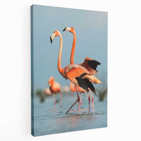 Stretched canvas wall art featuring vibrant flamingo designs in shades of pink and green, ideal for tropical-themed decor or nature enthusiasts.