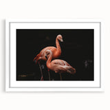 Framed wall art featuring a minimalistic flamingo design in soft pink and white, elegantly presented with a mat in a classic white frame, perfect for modern decor.