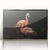 Framed wall art featuring a stylish flamingo design in vibrant pink hues, set in sleek silver acrylic, perfect for modern home decor.