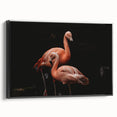 Framed canvas wall art featuring a vibrant flamingo design with a black frame, showcasing tropical colors and intricate details, perfect for modern decor.
