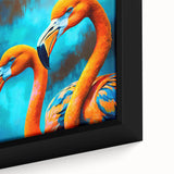 Framed canvas wall art featuring a vibrant close-up design of pink flamingos surrounded by tropical leaves, ideal for adding a lively touch to home decor.