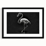 Framed wall art featuring a vibrant flamingo design, presented in a sleek black frame with a white mat, ideal for adding a tropical touch to home decor.