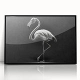 Framed acrylic wall art featuring a vibrant flamingo design in pink and green hues, presented in a sleek black frame, ideal for modern home decor.