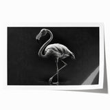 Vibrant flamingo wall art print featuring a tropical design with pink and green hues, elegantly rolled and packaged in a protective cardboard tube for easy display.