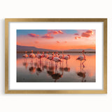 Framed wall art featuring a vibrant flamingo design in pink and gold hues, elegantly matted and showcased in a sleek gold frame, perfect for adding a tropical touch to home decor.