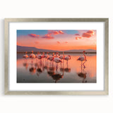Framed wall art featuring a pink flamingo design, elegantly displayed with a silver frame and mat, perfect for adding a vibrant touch to home decor.