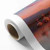 Flamingo-themed wall art print showcasing vibrant pink flamingos against a tropical background, rolled in a protective cardboard tube for easy display.