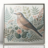 Framed wall art showcasing a vibrant garden bird design, featuring intricate details and a sleek silver frame, perfect for enhancing home decor with nature-inspired elegance.