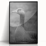 Framed wall art featuring a stylish black acrylic design of geese in flight, perfect for modern home decor. The piece showcases elegant lines and a sleek finish.