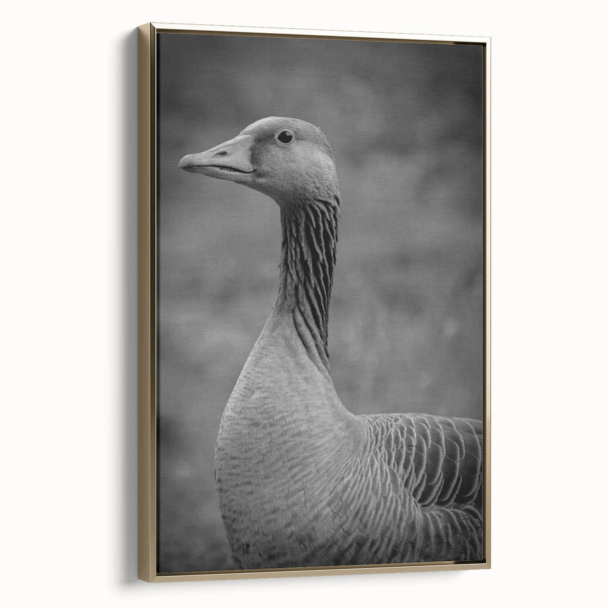Framed wall art featuring a golden-hued goose design, showcasing intricate details and textures against a neutral background, ideal for modern decor.