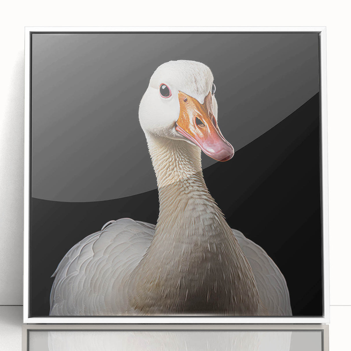 Framed wall art featuring a serene goose design in an elegant white frame, displayed against a neutral background, ideal for adding a touch of nature to home decor.