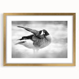 Framed wall art featuring a stylish goose design with a gold finish, elegantly matted, perfect for modern home decor. Ideal for enhancing living spaces.