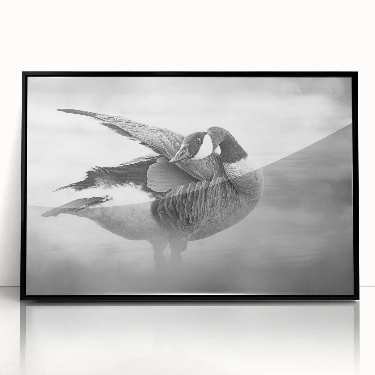 Framed wall art showcasing a stylish goose design in black acrylic, perfect for modern decor. The piece features intricate details and a sleek front view, enhancing any interior space.