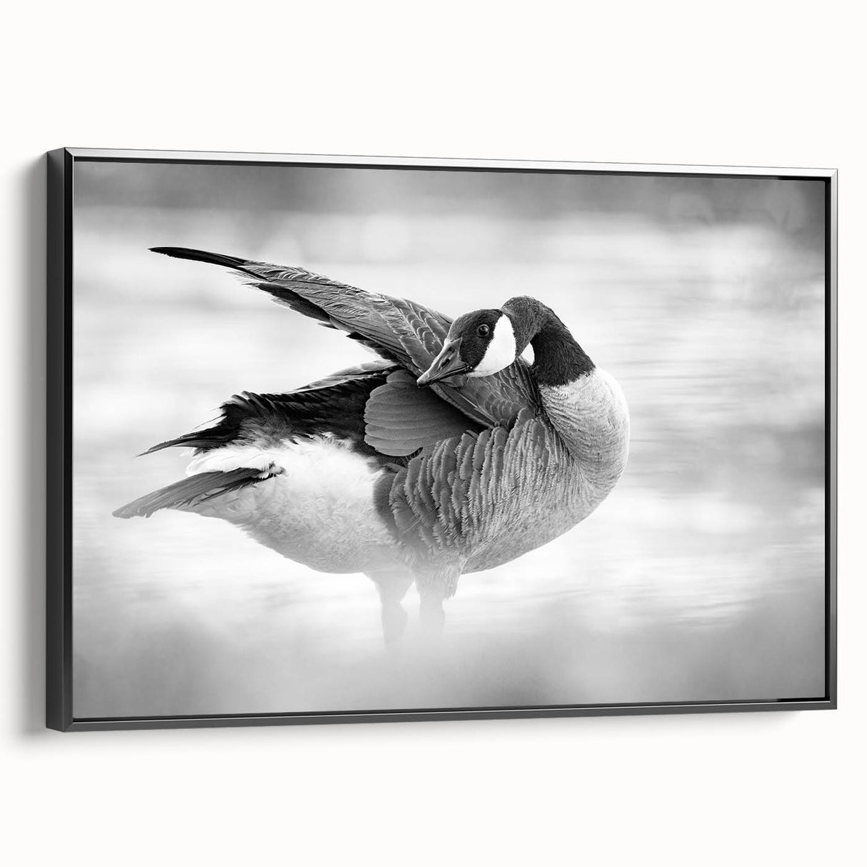 Framed wall art collection showcasing a stylish goose design on canvas, featuring a sleek black frame, perfect for modern home decor and accentuating interiors.