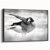 Framed wall art collection showcasing a stylish goose design on canvas, featuring a sleek black frame, perfect for modern home decor and accentuating interiors.