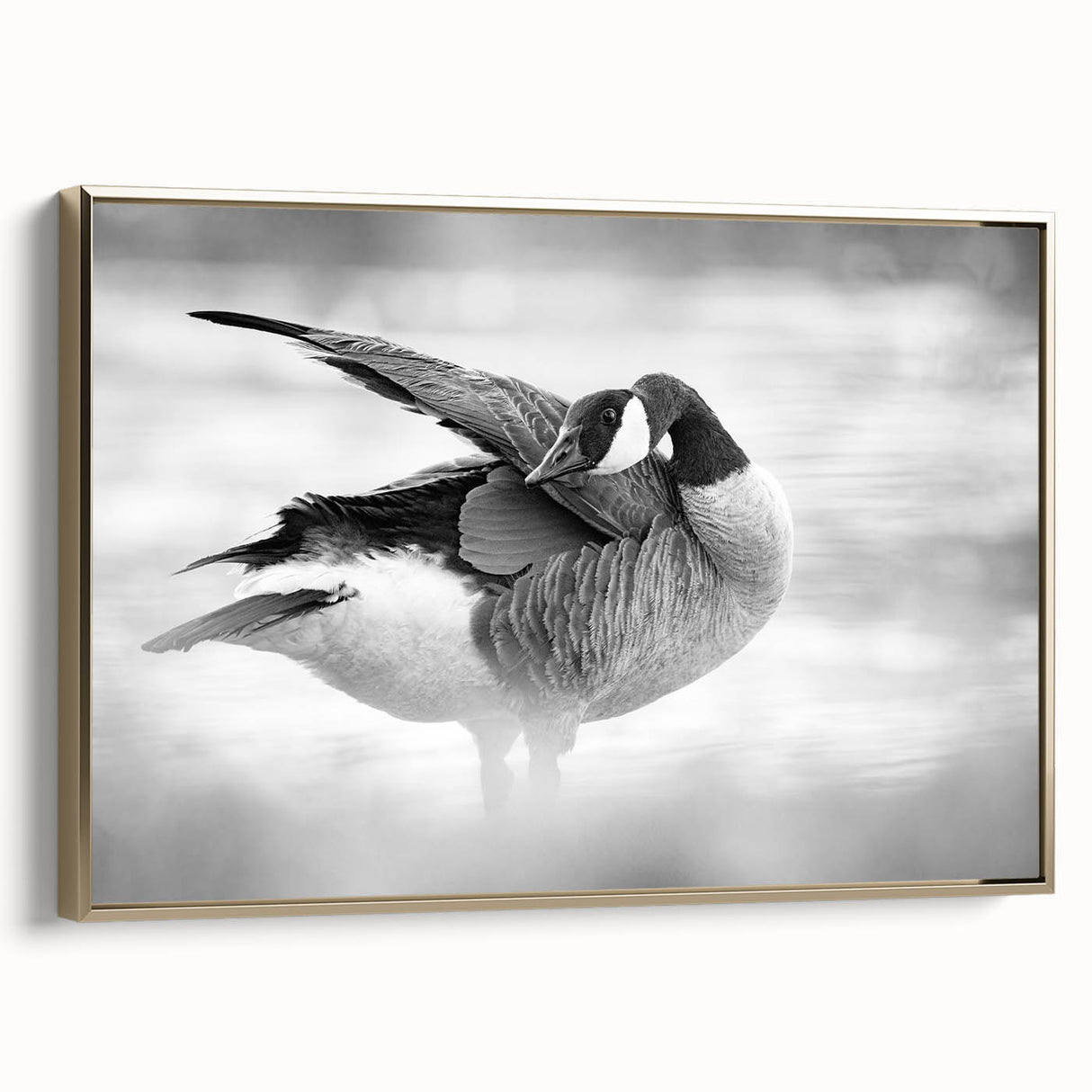 Framed wall art featuring a stylish goose design on canvas with gold accents, showcasing a side view of the artwork in a modern interior setting. Ideal for enhancing contemporary home decor.