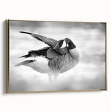 Framed wall art featuring a stylish goose design on canvas with gold accents, showcasing a side view of the artwork in a modern interior setting. Ideal for enhancing contemporary home decor.