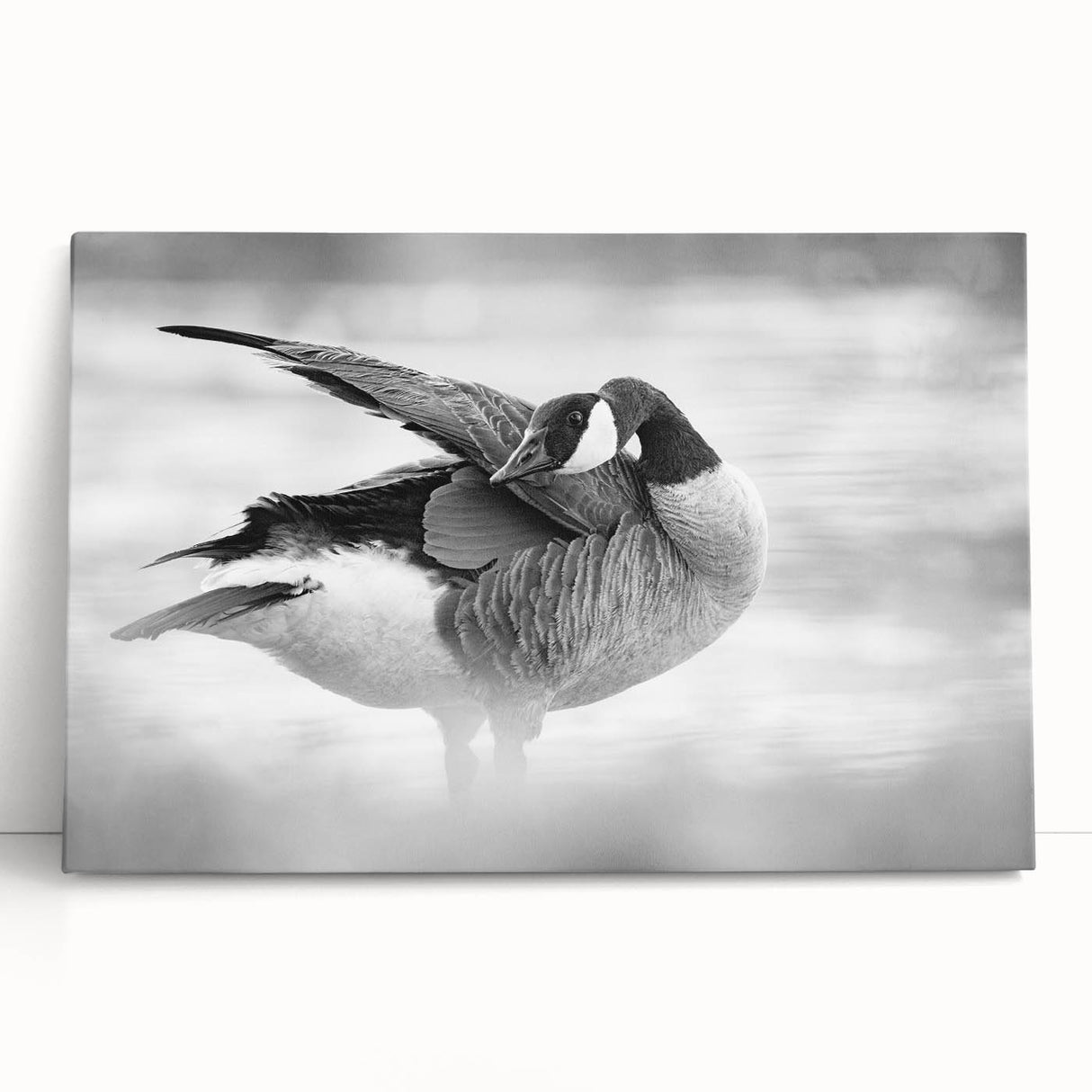 Stretched canvas wall art showcasing a serene goose design, featuring soft pastel colors and a minimalist aesthetic, perfect for modern home decor.
