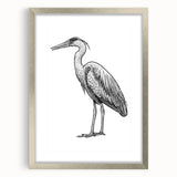 Framed wall art featuring elegant heron and egret designs in a silver frame with matting, showcasing a serene nature theme ideal for home decor.