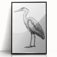 Framed wall art featuring a heron and egret design in an elegant black frame, showcasing intricate details and vibrant colors, perfect for enhancing home decor.