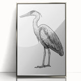 Framed wall art featuring a heron and egret design, set in a sleek silver frame with an acrylic front, showcasing intricate details and elegant colors, perfect for enhancing home decor.