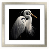 Elegant wall art featuring a heron and egret design in a silver frame with a white mat, perfect for enhancing home decor with a touch of nature.